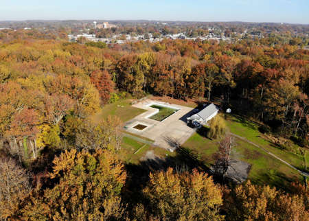 Newport, Delaware, U.S.A - November 11, 2020 - The aerial view of Crestmore Swimming Club surrounded by stunning colors of fall foliageのeditorial素材
