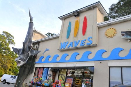 Tybee Island, Georgia, U.S.A - November 5, 2016 - The Waves souvenir store with a large shark on displayのeditorial素材