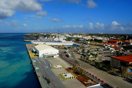 Oranjestad, Aruba - November 17, 2018 - The view of the ports, ships and buildings along the harborのeditorial素材