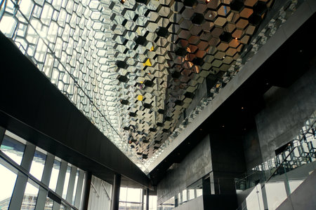 Reykjavik, Iceland - June 21, 2019 - The interior and glass ceilings inside of Harpa, the famous concert hall and conference centerのeditorial素材