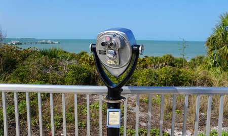 St Petersburg, Florida, U.S - February 16, 2021 - A public binocular near Fort Desoto Park