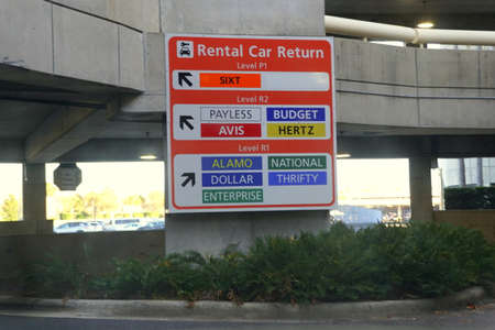 Orlando, Florida, U.S.A- February 16, 2021 - The terminal sign for car rental return at the airportのeditorial素材