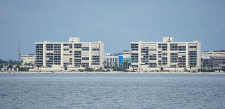 Madeira Beach, Florida, U.S.A - November 10, 2021 - The view of the waterfront buildings and condominium on the shoreのeditorial素材