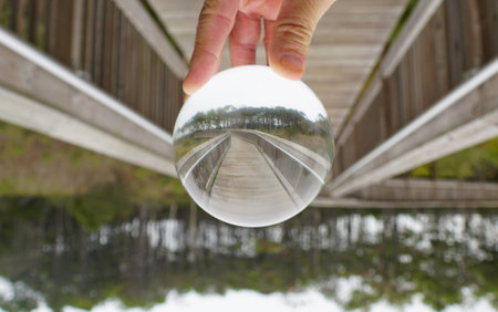 The wooden boardwalk captured through a lens ball near Assateague Island, Maryland, U.S.A