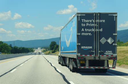 Spring Run, Pennsylvania, U.S - August 21, 2021 - A large Amazon truck moving on the highway
