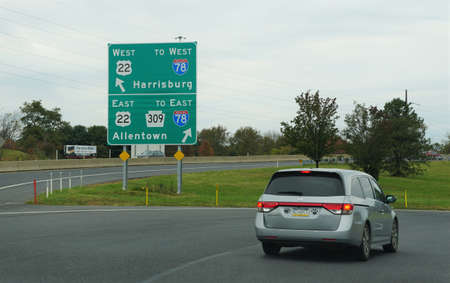 Pennsylvania, U.S.A - August 21, 2021 - The highway with sign into Route 22, 309 and Interstate 78...