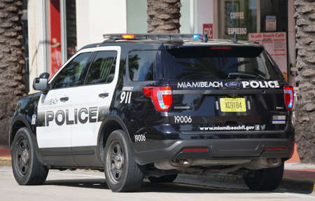 Miami Beach, Florida, U.S.A - February 17. 2022 - A white and black police SUV on the streetのeditorial素材