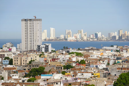 The distance view of the bay and buildings in the city on a sunny day near Mazatlan, Mexicoの写真素材