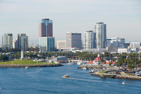 The view of the boat harbor and buildings in the city along Queensway Bay on a sunny day near Long Beach, California, U.S.Aの写真素材