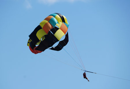 A distance view of a colorful parachute on the sky near Mazatlan, Mexicoの写真素材