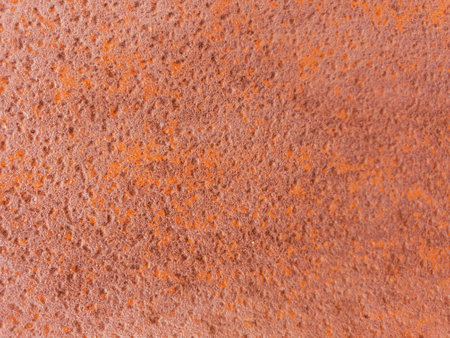 A rough surface and textured background of a rusted metal