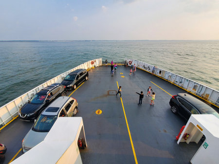 Lewes, Delaware, U.S.A - June 18, 2023 - Passengers and the vehicles parked on the Lewes - Cape May ferryのeditorial素材