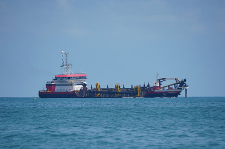 Dewey Beach, Delaware, U.S.A - July 16, 2023 - The Magdalen industrial ship on the bayのeditorial素材