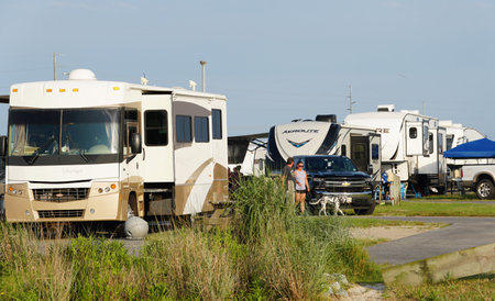 Bethany Beach, Delaware, U.S.A - July 8, 2023 - The RV and visitors by the camping groundのeditorial素材