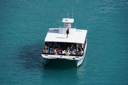 Puerto Palata, Dominican Republic - February 20, 2024 - A boat on the bay filled with passengersのeditorial素材