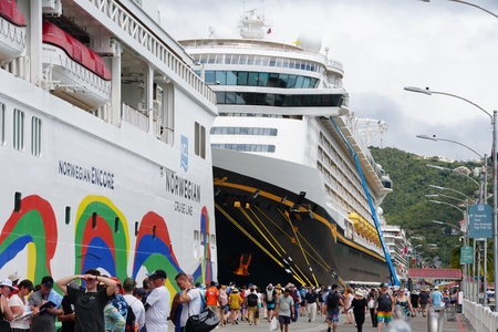 St Thomas, U.S Virgin Island - February 21, 2024 - The cruise ship passengers walking on the dock into the cityのeditorial素材