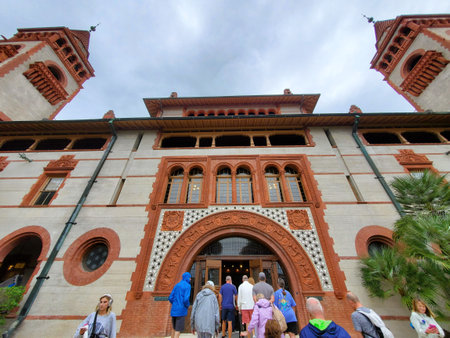St Augustine, Florida, U.S.A - November 18, 2023 - Students walking into the entrance of Ponce De Leon Hall at Flagler Collegeのeditorial素材