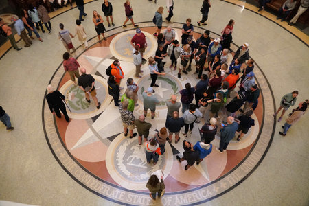 Austin, Texas, U.S.A - April 9, 2024 - Visitors gather on the ground floor of the Texas State...