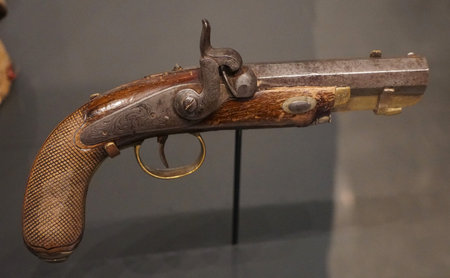 San Antonio, Texas, U.S.A - April 9, 2024 - The Governor Runnels' Caplock pistol on display inside of the Alamo Exhibitのeditorial素材