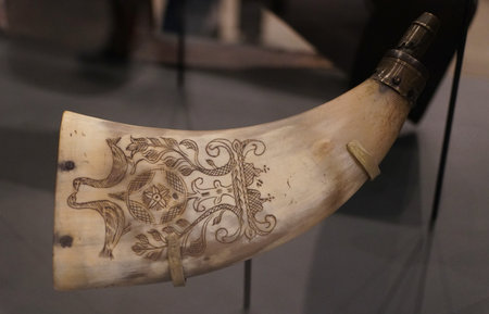 San Antonio, Texas, U.S.A - April 9, 2024 - The Ivory Powderhorn with intricate carvings on display inside of the Alamo Exhibitのeditorial素材