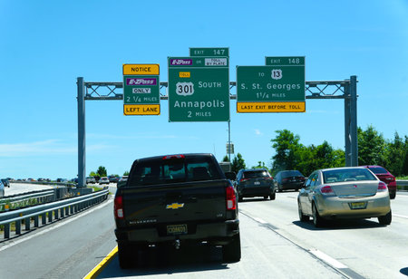 Middletown, Delaware, U.S - June 8, 2024 - The traffic on Route 1 South with the road sign towards Rt 301 South and Rt 13 Southのeditorial素材