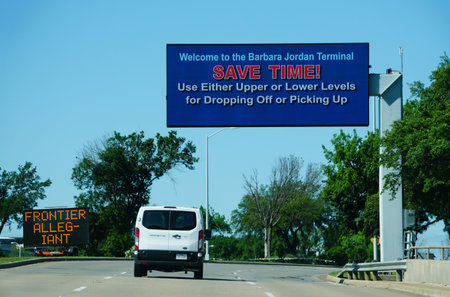 Austin, Texas, U.S.A - April 10, 2024 - The electronic sign into Barbara Jordan Terminal at Austin Bergstrom International Airportのeditorial素材