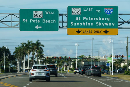Pinellas County, Florida, U.S - Nov 9, 2025 - Highway signs for State Road 682 West to St Pete Beach, and East towards Interstate 275 and St Petersburg Sunshine Skywayのeditorial素材