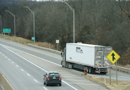Quakertown, Pennsylvania, U.S.A - Dec 26, 2025 - The Prime Inc semi-truck safely exits highway,...