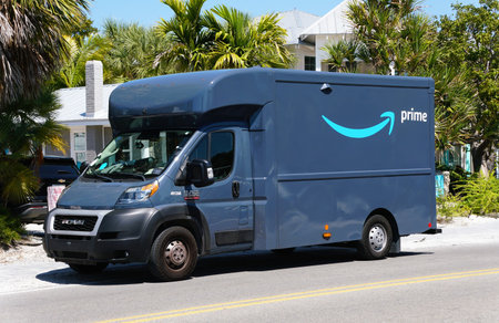 Anna Maria Island, Florida, U.S.A - March 26, 2026 - Amazon Prime delivery van parked in a tropical...