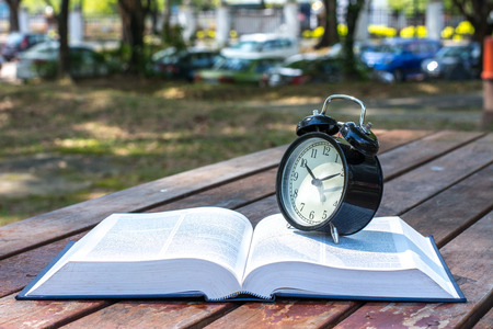 Clock and bookの写真素材