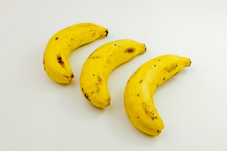 Ripe banana isolated on white backgroundの写真素材