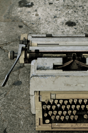 Ancient typewriter used in unsanitary conditions.の写真素材