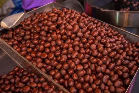 Chestnuts food on street food in Thailand- A snack often used in Asia. Soft Focus and blur.の写真素材