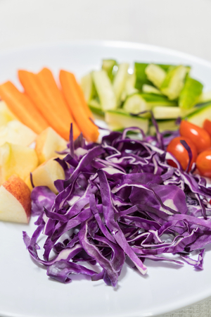 red cabbage ,apple,tomatoes ,carrots saladの写真素材