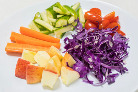 red cabbage ,apple,tomatoes ,carrots saladの写真素材
