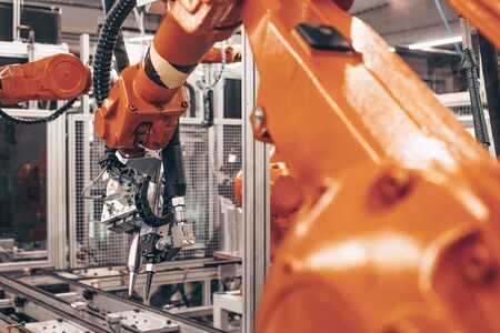 Stopped automatic arm robots in automotive industry, the global economic crisis in industry,...