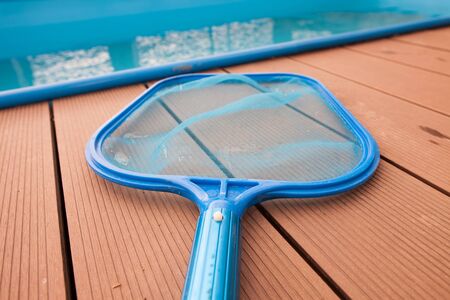Hand sieves, net for grime, disrt by the pool, maintenance, swimming poolの写真素材