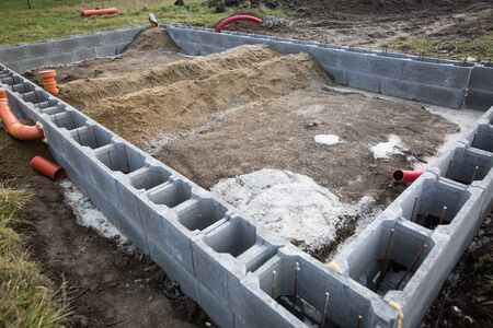 Foundations of the house, unfinished bungalow, rough construction, building a new houseの写真素材