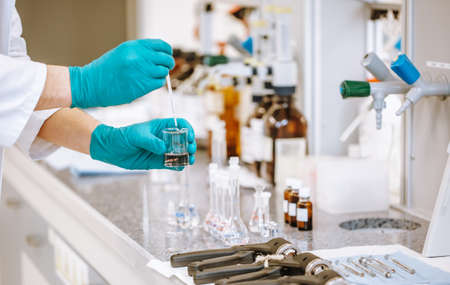Developing vaccine against coronavirus, covid-2019 in the pharmacy laboratory, chemical developの写真素材