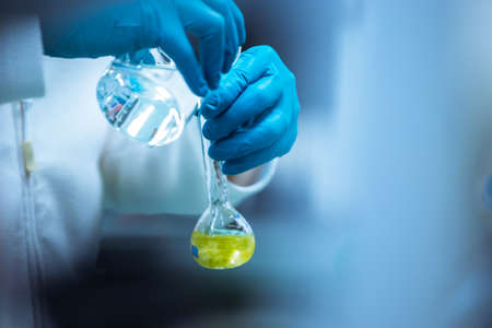 Coronavirus vaccine development in a pharmacy laboratory, chemistry conceptの写真素材