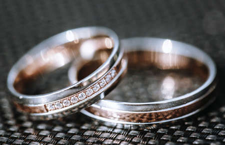 Close up of wedding rings from white gold, wedding concept