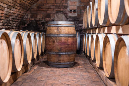 A wine cellar full of barrels of wine, alcohol conceptの写真素材