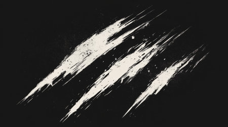 White claw marks scratching a black background leaving a trail of dustの素材