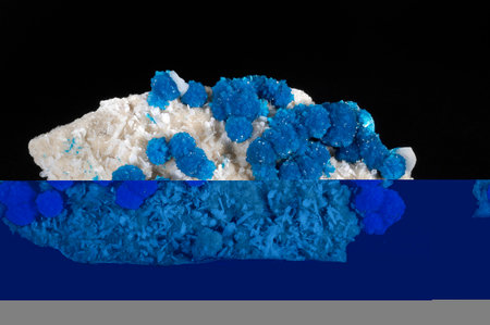 Cavansite with Calcite and Stilbite: A Vibrant Mineral Ensembleの写真素材