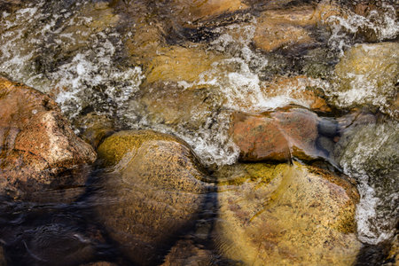 Close-Up of Rocks at the Bottom of Wissataquoik Streamの写真素材