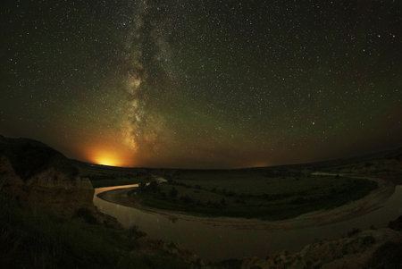 The Milky Way Above the Little Missouri River in Wind Canyon, Theodore Roosevelt National Parkの写真素材