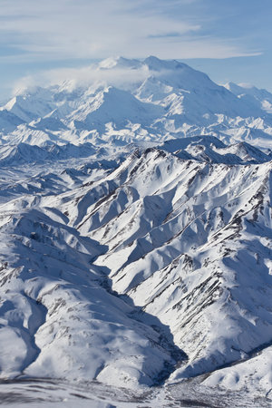 Aerial View of Snowy Mountains winter landscapeの写真素材