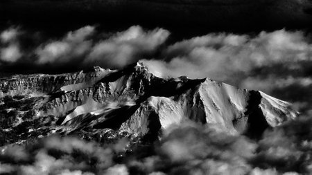 Dramatic Aerial View of Mountains and Cloudsの写真素材