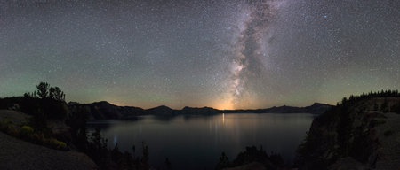 Milky Way Illuminates the Night Sky Over Crater Lakeの写真素材