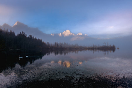 Clearing Fog Over Almsee: An Autumn Sunrise in the Salzkammergutの写真素材